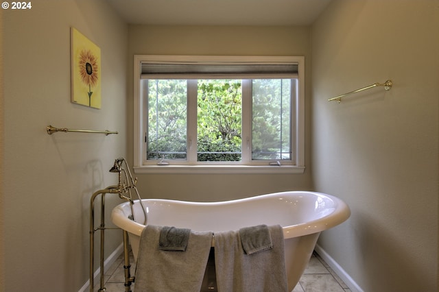 17130 Eastwood Ln, Brookings, OR 97415 - full bath with baseboards, tile patterned flooring, and a soaking tub