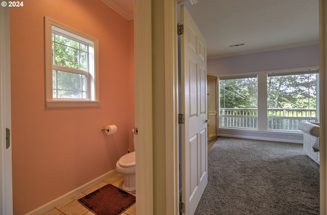 17130 Eastwood Ln, Brookings, OR 97415 - bathroom featuring toilet, crown molding, and baseboards