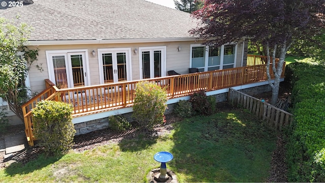 17130 Eastwood Ln, Brookings, OR 97415 - rear view of property featuring french doors, a shingled roof, a wooden deck, and a yard
