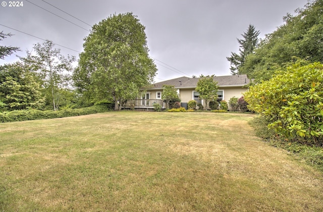 17130 Eastwood Ln, Brookings, OR 97415 - view of green lawn featuring a deck