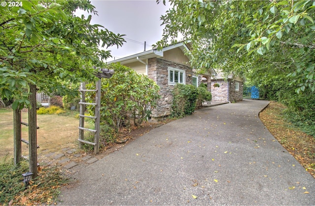 view of property hidden behind natural elements