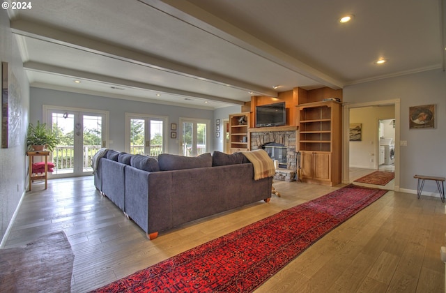 17130 Eastwood Ln, Brookings, OR 97415 - living room with a fireplace, beam ceiling, light wood finished floors, recessed lighting, and baseboards