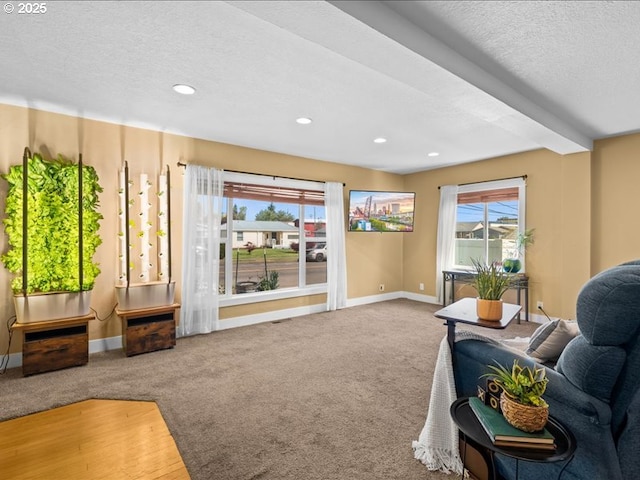 13283 NW Main St, Banks, OR 97106 - living room with recessed lighting, baseboards, a textured ceiling, and beamed ceiling