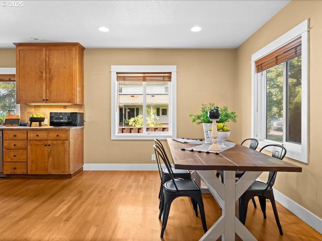 13283 NW Main St, Banks, OR 97106 - dining room with light wood-style floors, baseboards, and recessed lighting