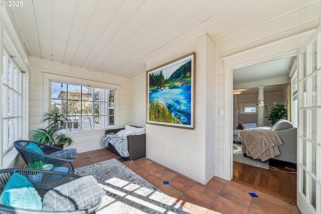 sunroom with wooden ceiling