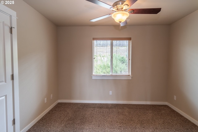 unfurnished room featuring baseboards, carpet floors, and ceiling fan