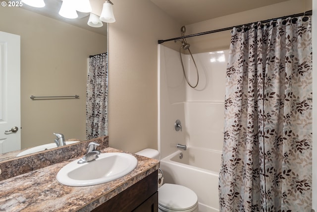 full bath featuring vanity, toilet, and shower / bath combo with shower curtain