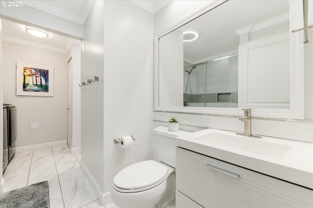 bathroom with toilet, independent washer and dryer, marble finish floor, crown molding, and vanity