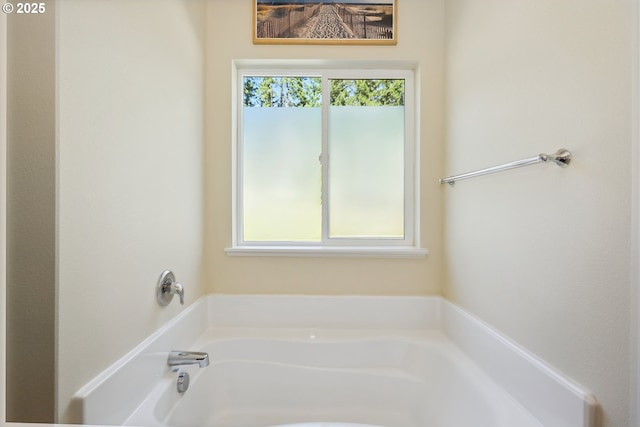 full bath with a garden tub