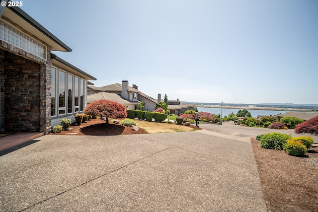 1421 SE 79th Ct, Vancouver, WA 98664 - view of yard featuring a water view and a patio area
