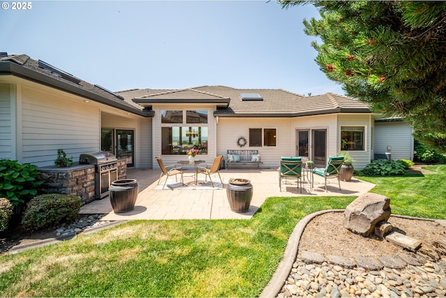 1421 SE 79th Ct, Vancouver, WA 98664 - back of property with area for grilling, a patio area, and a yard