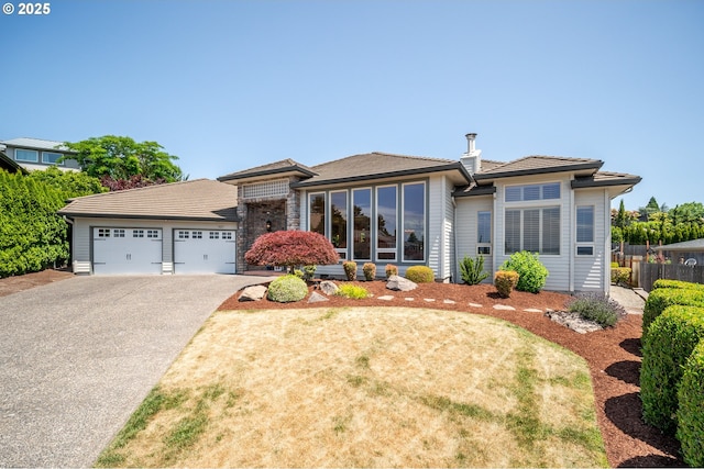 1421 SE 79th Ct, Vancouver, WA 98664 - view of front of home with driveway, a garage, and a tiled roof