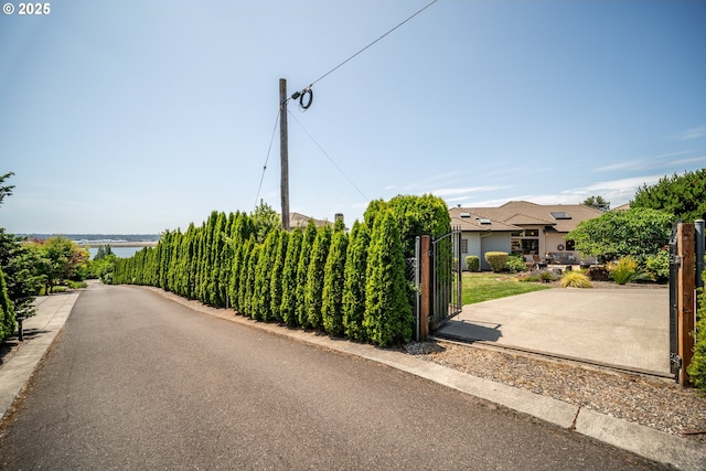 1421 SE 79th Ct, Vancouver, WA 98664 - view of asphalt road featuring a gate