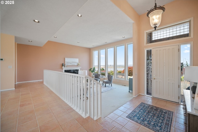 1421 SE 79th Ct, Vancouver, WA 98664 - entrance foyer featuring a glass covered fireplace, recessed lighting, and light tile patterned flooring