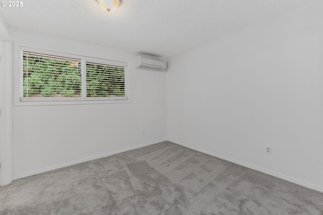 14613 NE 35th St, Vancouver, WA 98682 - carpeted empty room with baseboards and a wall mounted air conditioner
