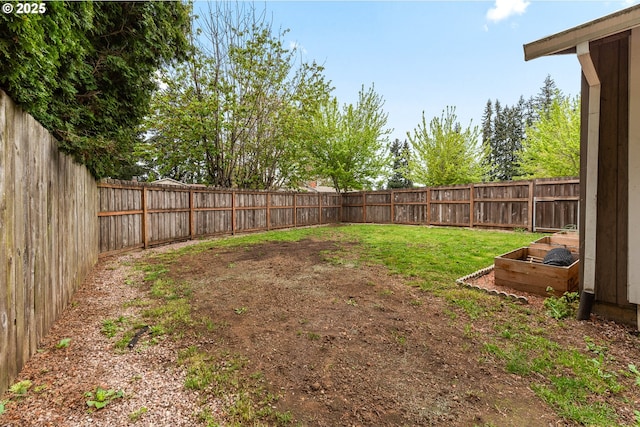 14613 NE 35th St, Vancouver, WA 98682 - view of yard featuring a fenced backyard and a garden