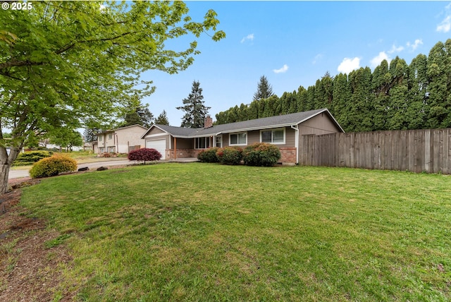 14613 NE 35th St, Vancouver, WA 98682 - single story home featuring a chimney, a front yard, brick siding, fence, and an attached garage