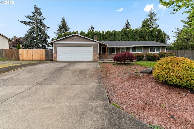 14613 NE 35th St, Vancouver, WA 98682 - single story home featuring fence, an attached garage, brick siding, a chimney, and driveway
