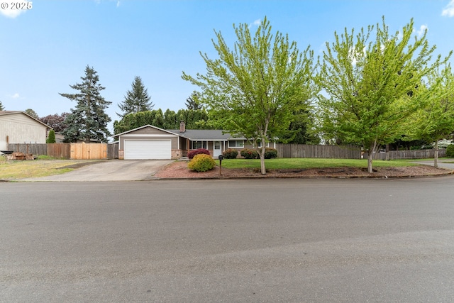 14613 NE 35th St, Vancouver, WA 98682 - ranch-style house with a garage, fence, a front yard, a chimney, and concrete driveway