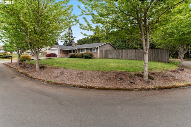 14613 NE 35th St, Vancouver, WA 98682 - single story home featuring a chimney, a garage, brick siding, fence, and a front lawn