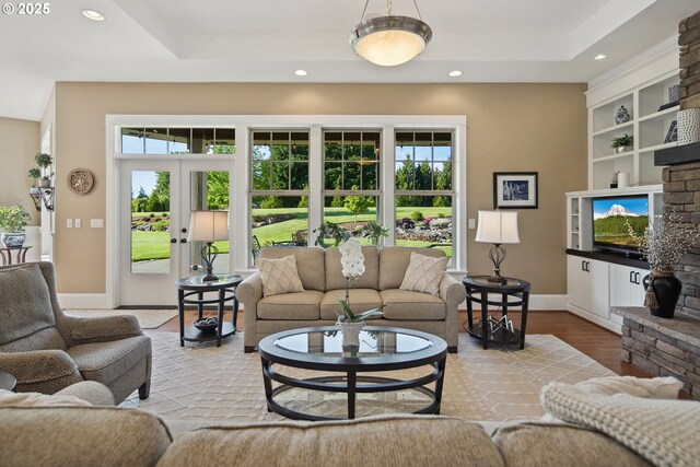 10000 NE 114th Cir, Vancouver, WA 98662 - living room featuring recessed lighting, baseboards, wood finished floors, built in shelves, and french doors