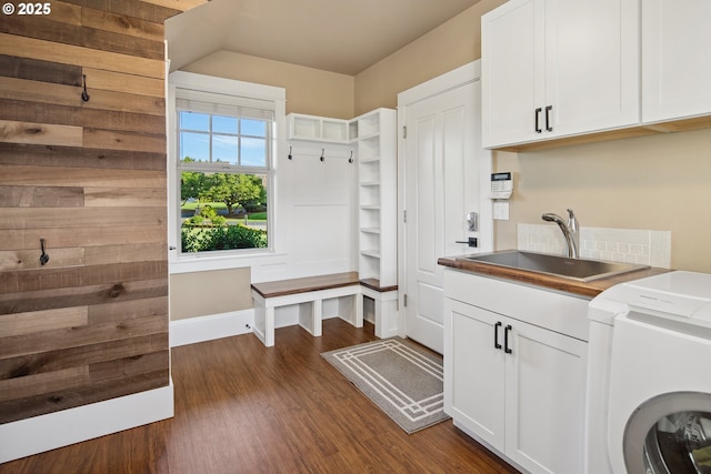 10000 NE 114th Cir, Vancouver, WA 98662 - laundry room with washer / dryer, cabinet space, dark wood-style floors, and baseboards
