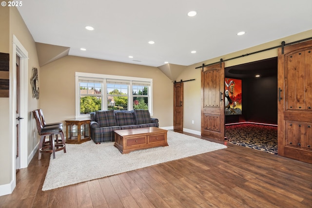 10000 NE 114th Cir, Vancouver, WA 98662 - living area with a barn door, hardwood / wood-style flooring, baseboards, and recessed lighting