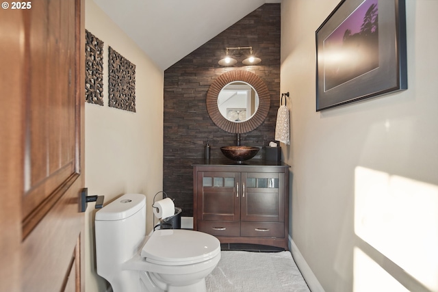 10000 NE 114th Cir, Vancouver, WA 98662 - bathroom with toilet, tile patterned flooring, vanity, and high vaulted ceiling
