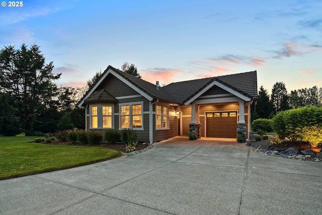 10000 NE 114th Cir, Vancouver, WA 98662 - craftsman inspired home with driveway, an attached garage, and a yard