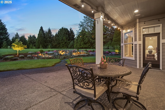 10000 NE 114th Cir, Vancouver, WA 98662 - patio terrace at dusk with a lawn