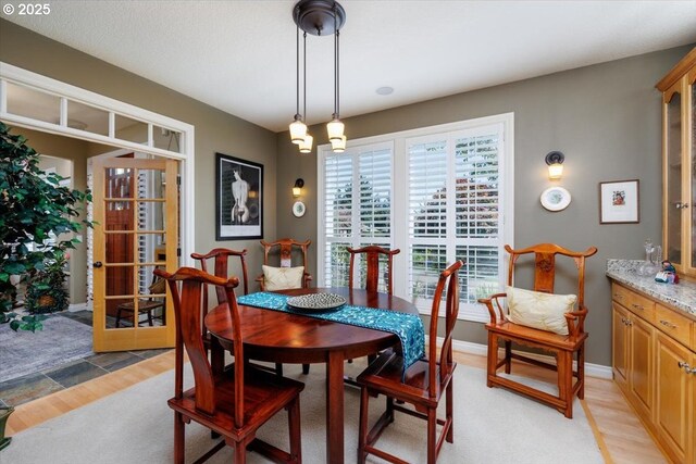 725 E Ave, Lake Oswego, OR 97034 - dining room with light wood-style flooring, baseboards, and french doors