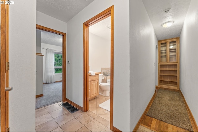 123 Scenic View Dr, Longview, WA 98632 - hallway with a textured ceiling and baseboards