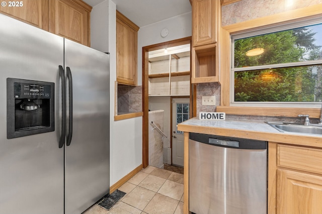 123 Scenic View Dr, Longview, WA 98632 - kitchen featuring appliances with stainless steel finishes, light tile patterned floors, and decorative backsplash