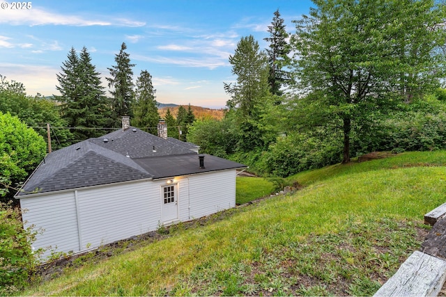 123 Scenic View Dr, Longview, WA 98632 - view of side of property featuring a shingled roof and a chimney
