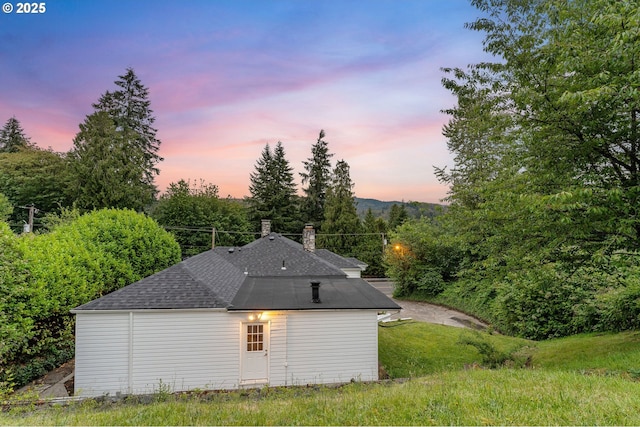 123 Scenic View Dr, Longview, WA 98632 - view of side of home with roof with shingles and a chimney