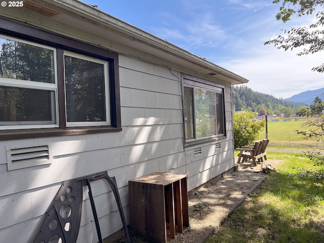 76464 High St, Oakridge, OR 97463 - view of home's exterior with a mountain view