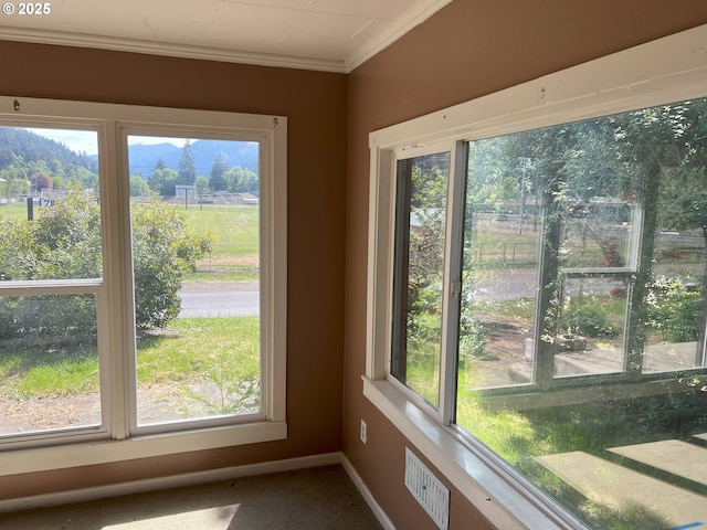 76464 High St, Oakridge, OR 97463 - unfurnished sunroom featuring healthy amount of natural light and a mountain view