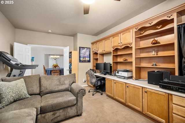 office area with light colored carpet and ceiling fan with notable chandelier