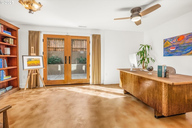 office area with french doors, a ceiling fan, and visible vents