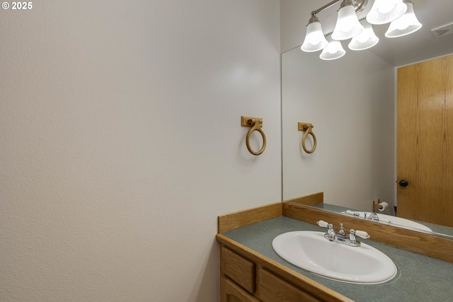 2907 NE 166th Pl, Vancouver, WA 98682 - bathroom with a chandelier and vanity