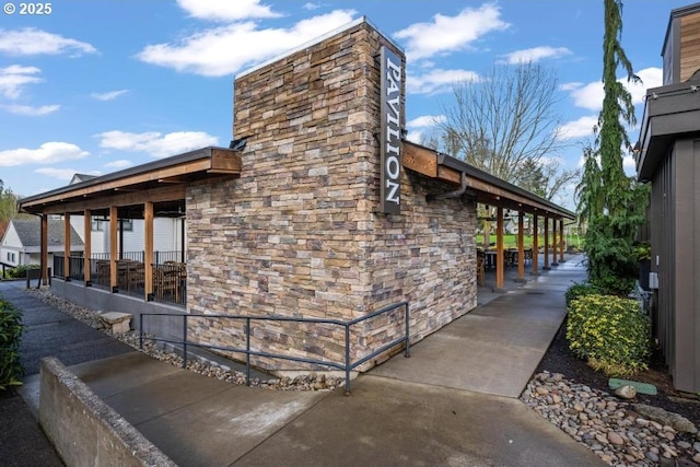 9998 SW French Prairie Rd, Wilsonville, OR 97070 - view of side of property featuring stone siding