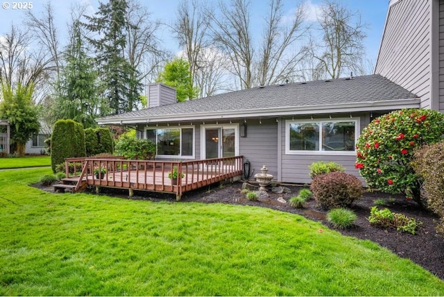 9998 SW French Prairie Rd, Wilsonville, OR 97070 - rear view of property with roof with shingles, a wooden deck, a lawn, and a chimney