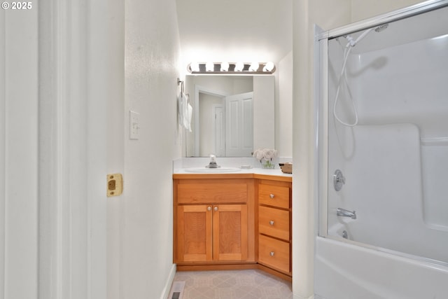 bathroom with shower / washtub combination and vanity