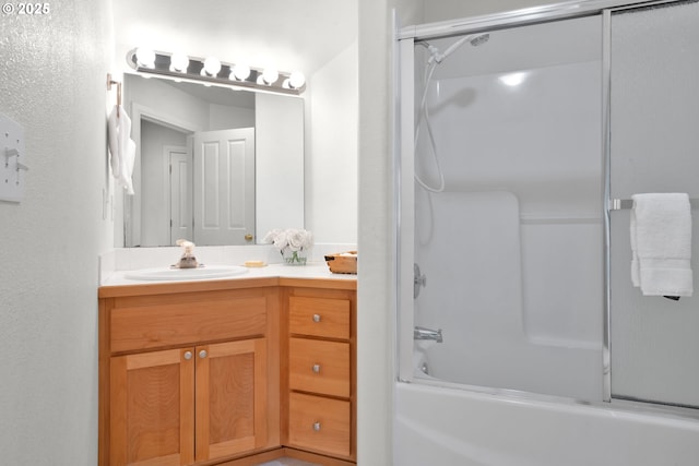 bathroom with vanity and  shower combination