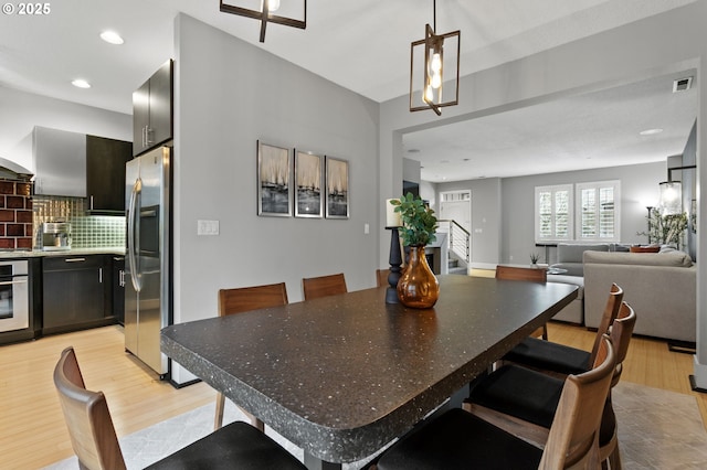 dining area featuring light hardwood / wood-style flooring