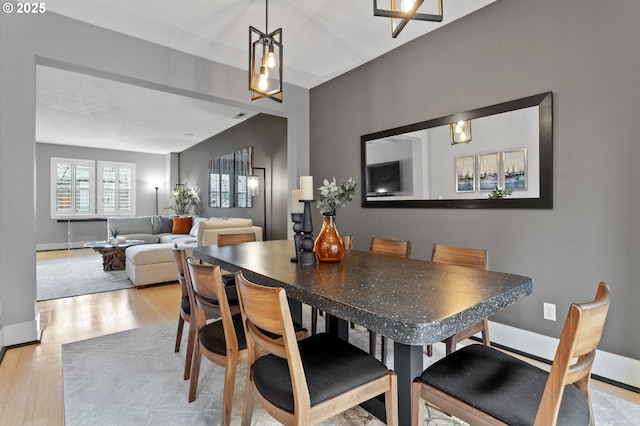 dining area featuring light hardwood / wood-style floors