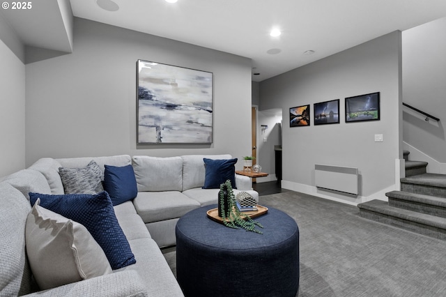 living room with carpet flooring and heating unit