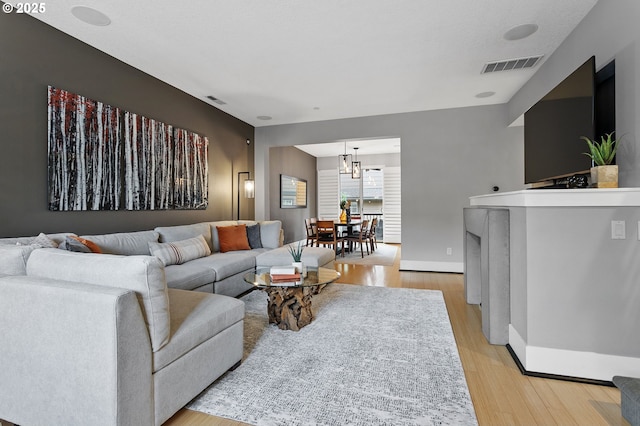 living room featuring light wood-type flooring