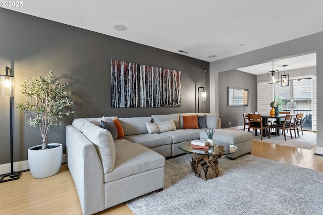 living room with light hardwood / wood-style floors