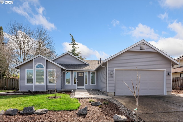 ranch-style house featuring driveway, roof with shingles, an attached garage, fence, and a front lawn